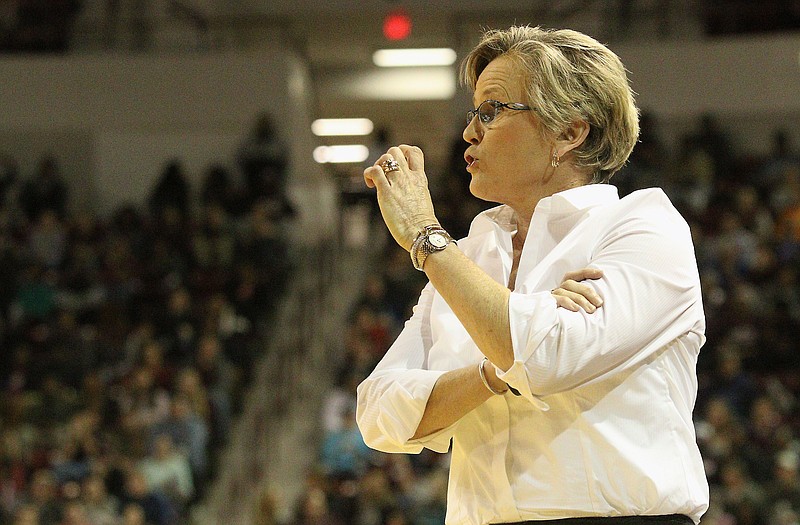 Tennessee head coach Holly Warlick calls the play into her team during the second half of an NCAA college basketball game against Mississippi State in Starkville, Miss., Thursday, Jan. 28, 2016. No. 13 Mississippi State won 65-63. (AP Photo/Jim Lytle)