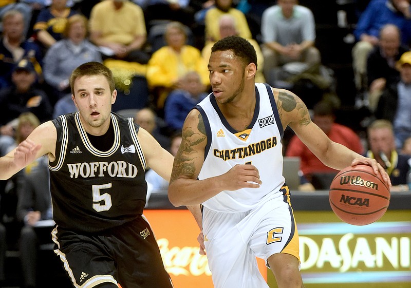 UTC's Johnathan Burroughs-Cook is guarded by Wofford's Eric Garcia Thursday, February 4, 2016 at McKenzie Arena.