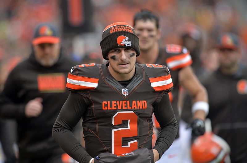 
              FILE - in this Dec. 6, 2015, file photo, Cleveland Browns quarterback Johnny Manziel walks off the field at halftime of an NFL football game against the Cincinnati Bengals in Cleveland. The Browns said in a statement, Tuesday, Feb. 2, 2016, that Manziel's troubles off the field have undermined his teammates and the organization. (AP Photo/David Richard, File)
            