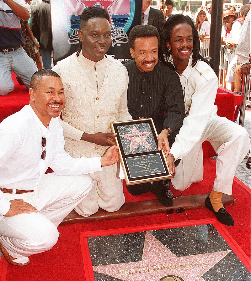 
              FILE - In this Sept. 14, 1995 file photo, Ralph Johnson, from left,  Phillip Bailey, Maurice White and Verdine White, of Earth, Wind & Fire  in Los Angeles. Maurice White, the founder and leader of Earth, Wind & Fire, died at home in Los Angeles, Wednesday, Feb. 3, 2016, said his brother, Verdine White. He was 74. (AP Photo/Kevork Djansezian, File)
            