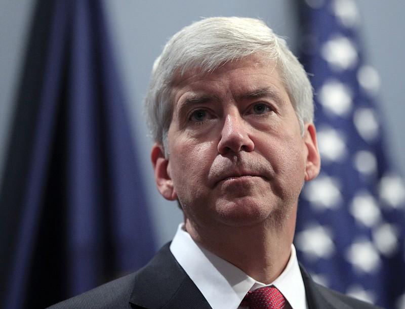 
              FILE - In this Dec. 11, 2012 file photo, Gov. Rick Snyder speaks in Lansing, Mich. When Snyder disclosed a spike in Legionnaires’ cases in Flint, Mich., on Jan. 13, 2016, he said he had learned about it just a couple days earlier.  Internal emails however show high-ranking officials in Snyder’s administration were aware of a surge in Legionnaires’ disease potentially linked to Flint’s water long before the governor reported the increase to the public last month. (AP Photo/Carlos Osorio, File)
            