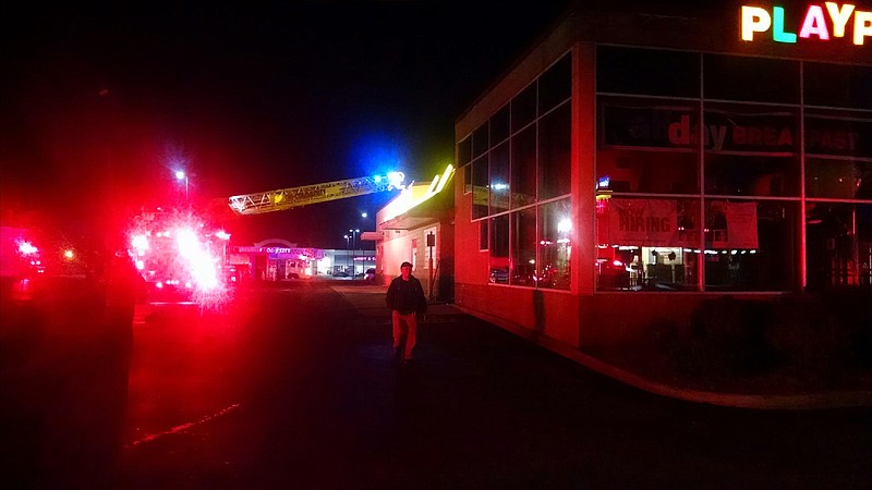 Firefighters work to put out an early morning blaze Thursday, Feb. 4, at the Lee Highway McDonald's in Ooltewah.