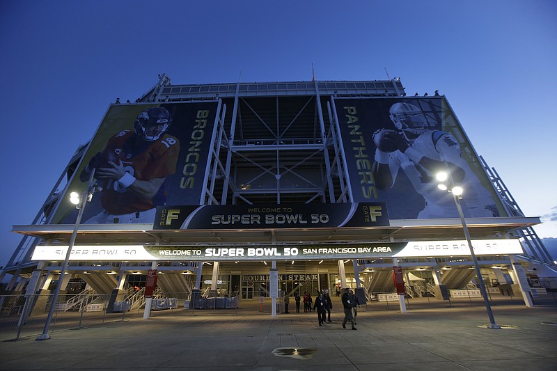 
              The entrance to Levi's Stadium is decorated with images of Denver Broncos quarterback Peyton Manning, left, and Carolina Panthers quarterback Cam Newton Tuesday, Feb 2, 2016 in Santa Clara, Calif. The Denver Broncos will play the Carolina Panthers in the NFL Super Bowl 50 football game Sunday, Feb. 7, 2015, at Levi's Stadium. (AP Photo/Marcio Jose Sanchez)
            