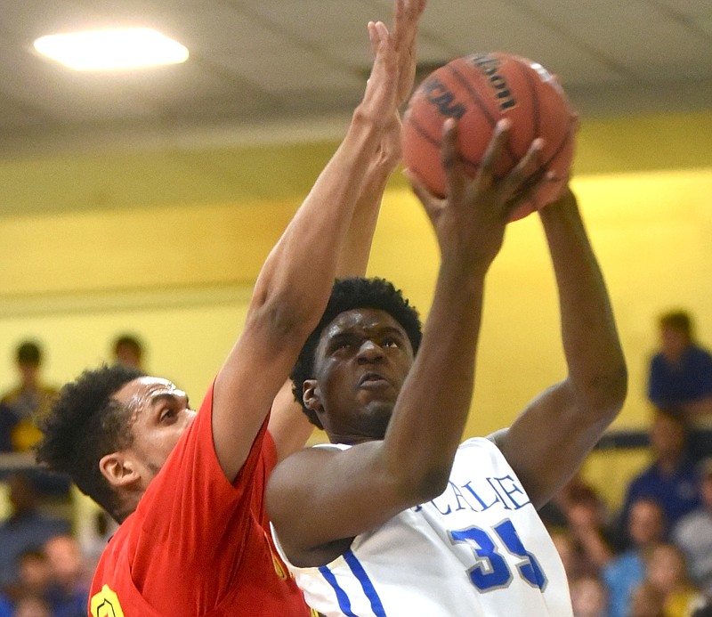 McCallie's Jorden Starling is guarded by Oak Hill's Rodney Miller Friday, February 5, 2016 at McCallie.