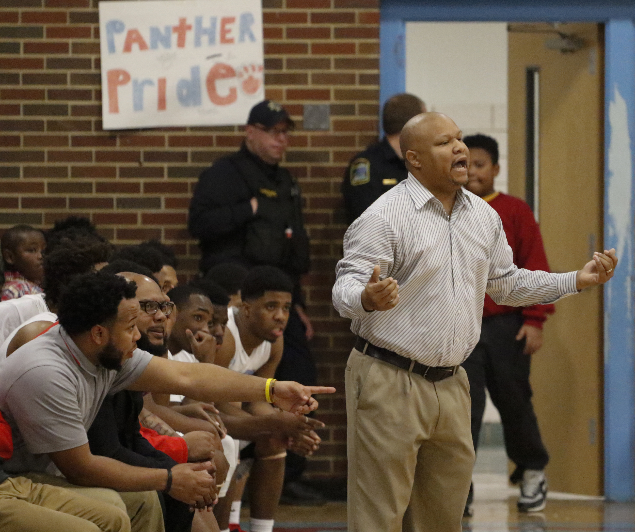 Staff Photo by Dan Henry / The Chattanooga Times Free Press- 2/5/16. Brainerd's head coach motivates his players as they battle Tyner on Friday, February 5, 2016.