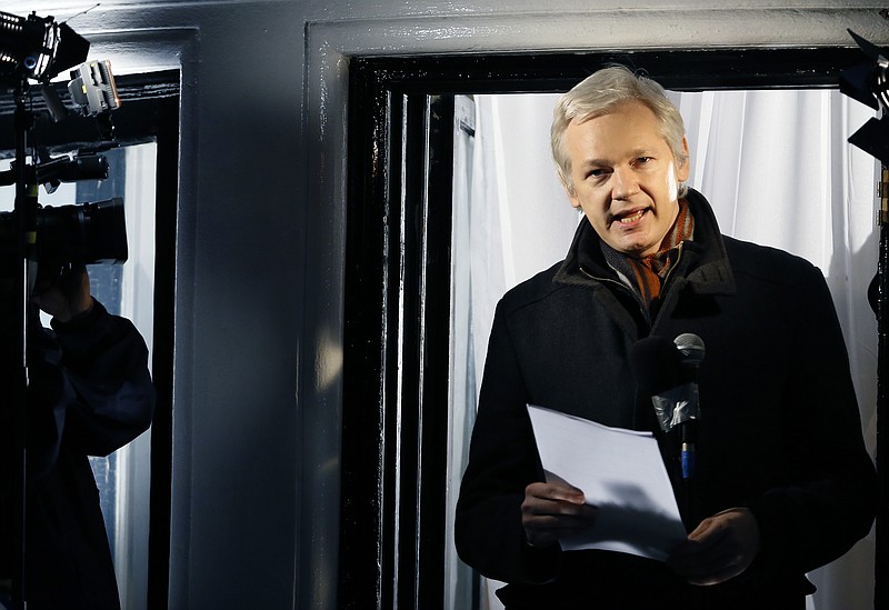 
              FILE - In this Thursday, Dec. 20, 2012, file photo, Julian Assange, founder of WikiLeaks speaks to the media and members of the public from a balcony at the Ecuadorian Embassy in London. WikiLeaks founder Julian Assange said Wedneday Feb. 3, 2016 that he will accept arrest by British police if a U.N. working group investigating his claims decides that the three years he has spent inside the Ecuadorean Embassy doesn't amount to illegal detention. (AP Photo/Kirsty Wigglesworth, File)
            