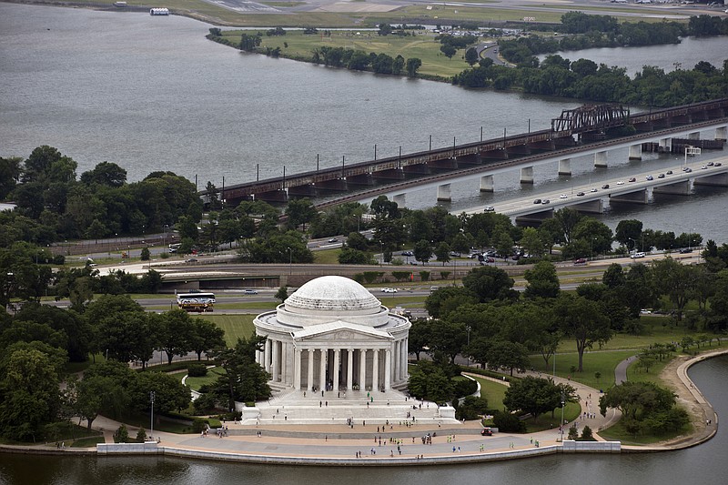 
              FILE - In this June 2, 2013 file photo, the Jefferson Memorial is seen from the Washington Monument in Washington. As the National Park Service celebrates its 100th anniversary, it faces billions of dollars in delayed maintenance for projects ranging from replacing water works at the Grand Canyon to making sure the Jefferson Memorial doesn’t sink into the Tidal Basin.  (AP Photo/Alex Brandon, File)
            