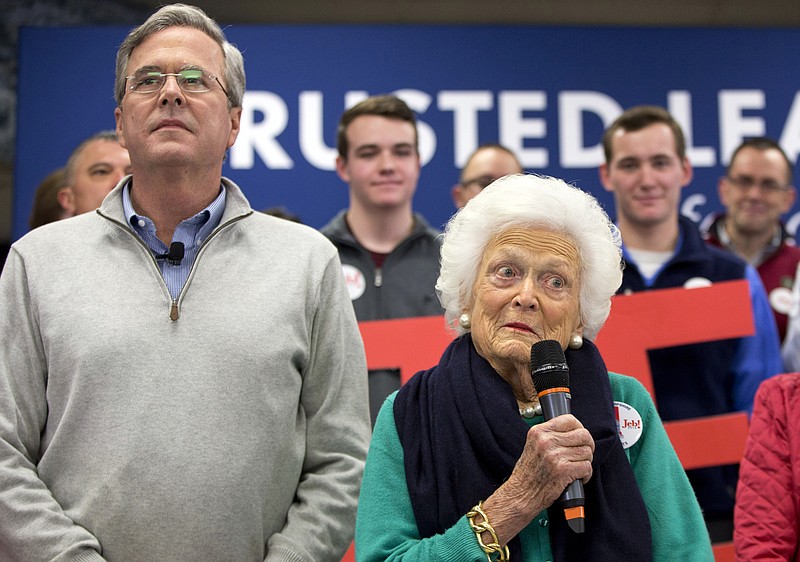 
              Barbara Bush, right, mother of Republican presidential candidate, former Florida Gov. Jeb Bush, left, introduces her son at a town hall meeting at West Running Brook Middle School in Derry, N.H., Thursday Feb. 4, 2016. (AP Photo/Jacquelyn Martin)
            