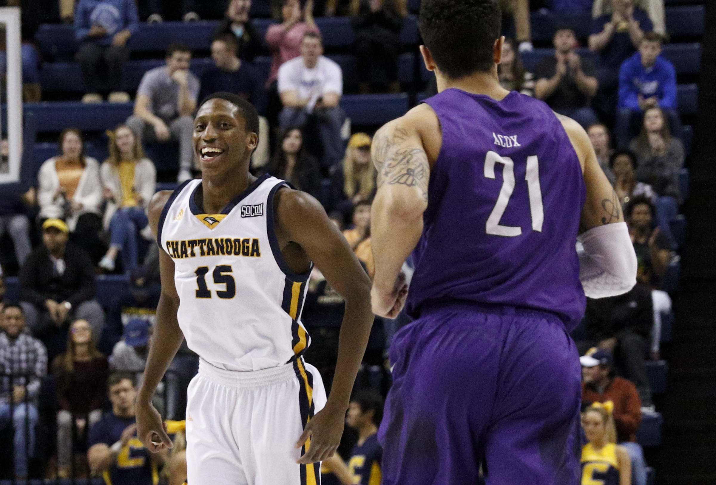 UTC guard Eric Robertson reacts to hitting a 3 during the Mocs' home basketball game against the Furman Paladins at McKenzie Arena on Saturday, Feb. 6, 2016, in Chattanooga, Tenn.