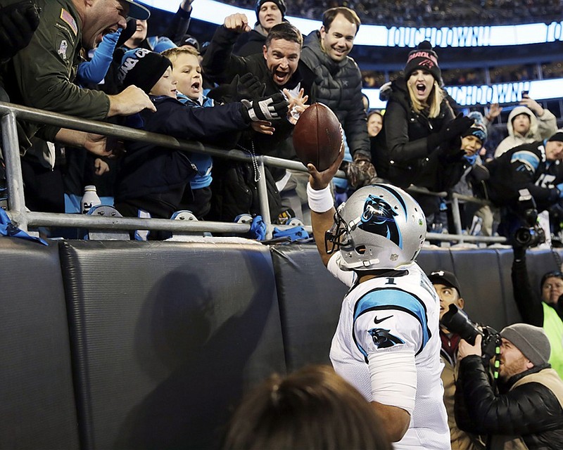 Carolina Panthers quarterback Cam Newton has made giving a ball to a young fan after a touchdown during home games the Bank of America Stadium version of the Lambeau Leap. But that's just a small part of what he has done to connect with others and be a good example off the field.