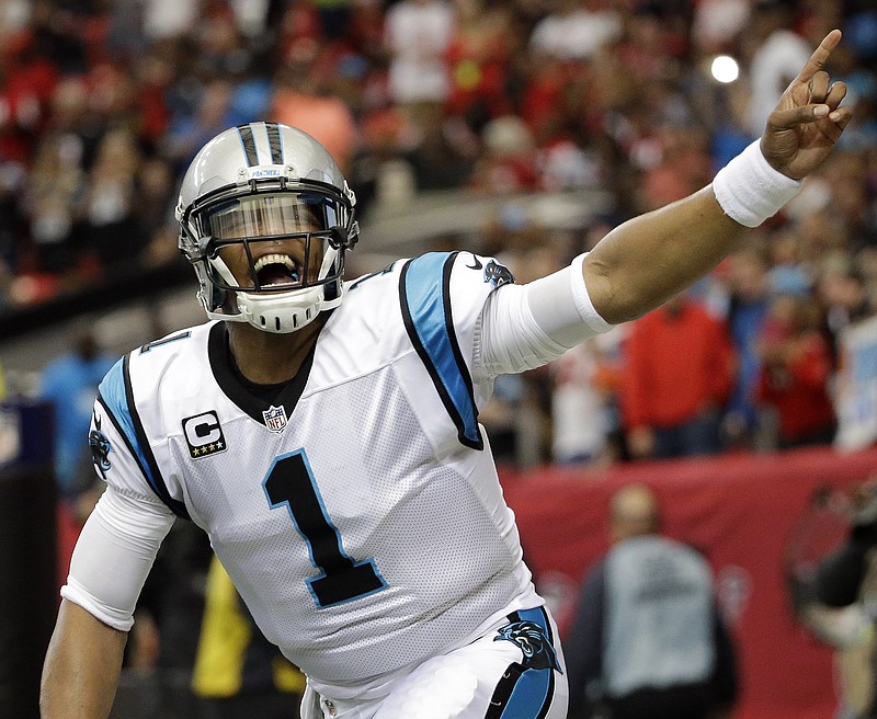 
              FILE - In this Dec. 27, 2015, file photo, Carolina Panthers quarterback Cam Newton celebrates his touchdown against the Atlanta Falcons during an NFL football game in Atlanta. Newton's spectacular season has earned him The Associated Press NFL Offensive Player of the Year award. (AP Photo/David Goldman, File)
            