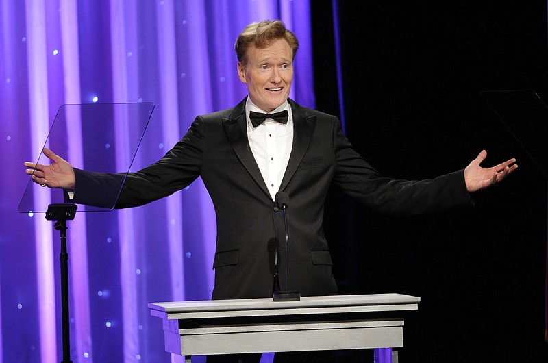 
              FILE - In this Oct. 8, 2014 file photo, Conan O'Brien addresses the audience during the 2014 Princess Grace Awards Gala in Beverly Hills, Calif. O’Brien will visit Harvard on Friday, Feb. 12, 2016, for a conversation about arts and education with university President Drew Faust followed by questions from the audience. (Photo by Chris Pizzello/Invision/AP, FIle)
            