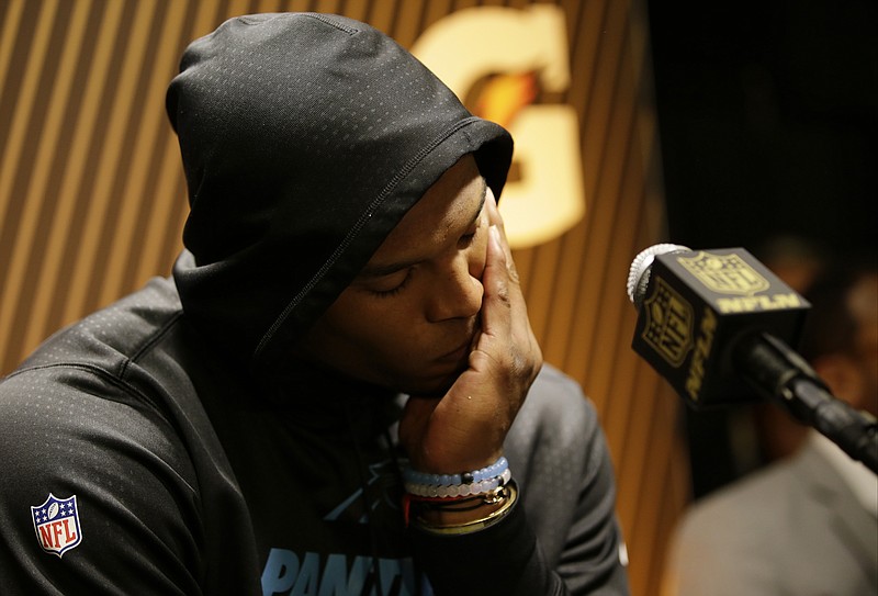 
              Carolina Panthers’ Cam Newton answers questions after the NFL Super Bowl 50 football game against the Denver Broncos Sunday, Feb. 7, 2016, in Santa Clara, Calif.  The Broncos won 24-10. (AP Photo/Marcio Jose Sanchez)
            