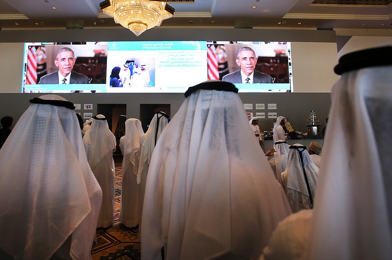 
              Emirati officials watch U.S. President Barack Obama's keynote address at the opening ceremony of the World Government Summit in Dubai, United Arab Emirates, Monday, Feb. 8, 2016. Those gathered for the World Government Summit in Dubai offered no immediate solutions to the crises gripping the region, like low global oil prices, global warming and the rise of violent extremism. But all acknowledged that keeping government responsive to its citizens remains crucial. (AP Photo/Kamran Jebreili)
            