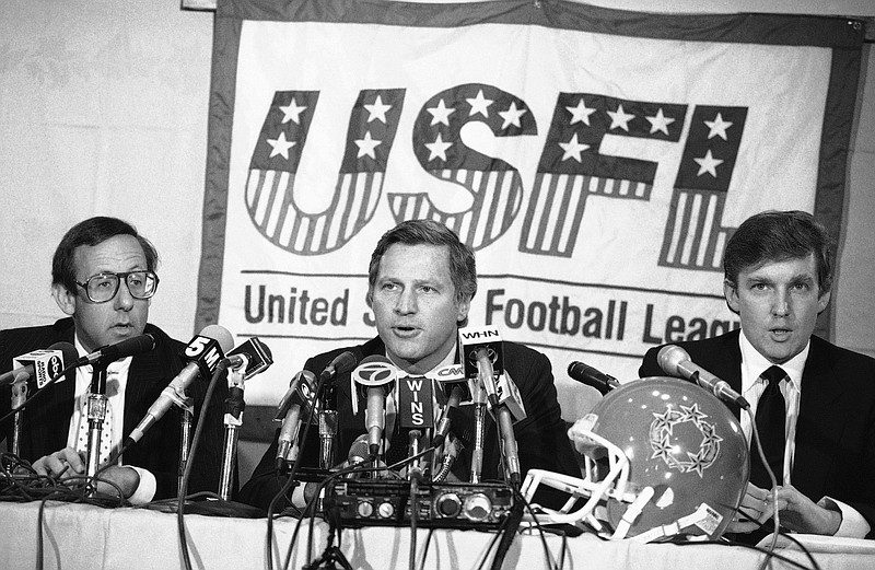 
              FILE - In this Aug. 2, 1985, file photo, Donald Trump, right, New York real estate magnates Stephen Ross, left, and USFL Commissioner Harry L. Usher, center, participate in a news conference in New York to discuss the agreement they have reached in principle to merge the Houston Gamblers and New Jersey Generals football franchises. The New Jersey Generals have been largely forgotten, but Trump’s ownership of the team was formative in his evolution as a public figure and peerless self-publicist. With money and swagger, he led a shaky and relatively low-budget spring football league, the USFL, into a showdown with the NFL. (AP Photo/Marty Lederhandler, File)
            