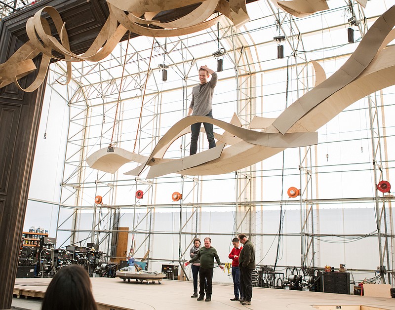 
              Andrew Keenan-Bolger, center, stands on set under construction at a scene shop in New Windsor, N.Y., where the set for the musical “Tuck Everlasting” is being made. In the new musical “Tuck Everlasting,” the actor plays a character who simply doesn’t fear death.  (Jeremy Daniel/ Matt Ross Public Relations via AP)
            