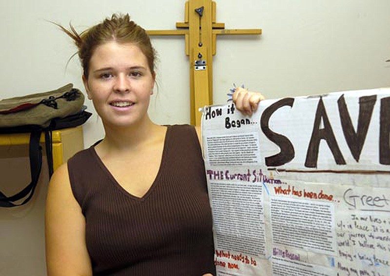 
              FILE - In this May 30, 2013, file photo, Kayla Mueller is shown after speaking to a group in Prescott, Ariz. The wife of a former senior leader of the Islamic State has been charged in federal court with contributing to the death of Mueller. The Justice Department on Feb. 8, 2016 announced charges against 25-year-old Nisreen Assad Ibrahim Bahar, who's also known as Umm Sayyaf. (AP Photo/The Daily Courier, Jo. L. Keener, File)
            