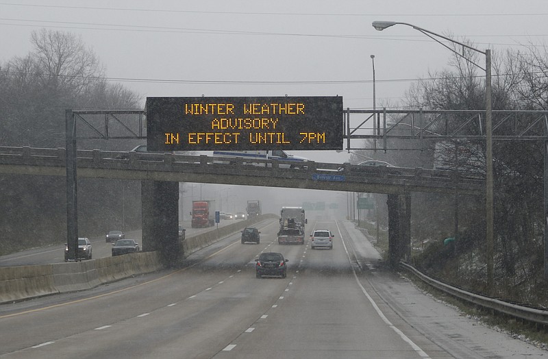 In this 2015 file photo, light traffic moves along I-24 as snow falls in the Chattanooga area on February 9, 2015. 