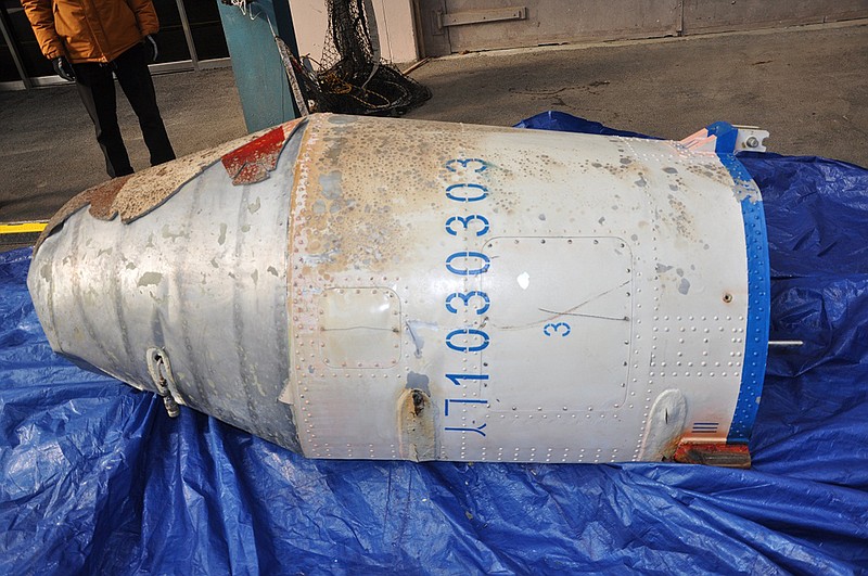 
              In this photo provided by the South Korean Defense Ministry, an object that the South Korean Defense Ministry believes to be a part of a North Korean rocket is displayed on a South Korean navy ship Tuesday, Feb. 9, 2016, in undisclosed location, South Korea. While government leaders around the world are trying to figure out how to punish North Korea for its Feb. 7 rocket launch, the U.S., Japanese and South Korean militaries are scouring the seas for debris and analysts are studying photos, trajectories - anything that might provide insight into North Korean rocketry skills. (South Korean Defense Ministry via AP)
            