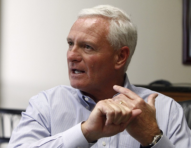 In this April 19, 2013, file photo, Jimmy Haslam, owner of the Cleveland Browns, speaks during a news conference in Knoxville