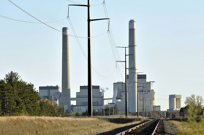 This Oct. 20, 2010, file photo, shows Xcel Energy's Sherco Power Plant is shown in Becker, Minn. A divided Supreme Court agreed Feb. 9, 2016, to halt enforcement of President Barack Obama's sweeping plan to address climate change until after legal challenges are resolved. 
