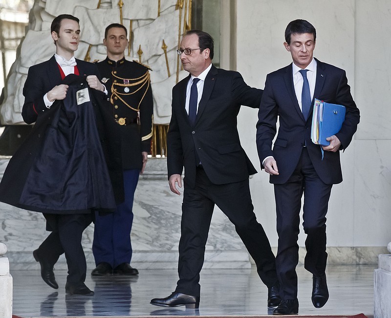 
              French President Francois Hollande, left, and French Prime Minister Manuel Valls leave the weekly cabinet meeting at the Elysee Palace in Paris, Wednesday, Feb. 10, 2016. French foreign minister Laurent Fabius says he is to leave the government to be named at the head of the Constitutional Council, France’s top court making sure bills are compliant with the Constitution. (AP Photo/Michel Euler)
            