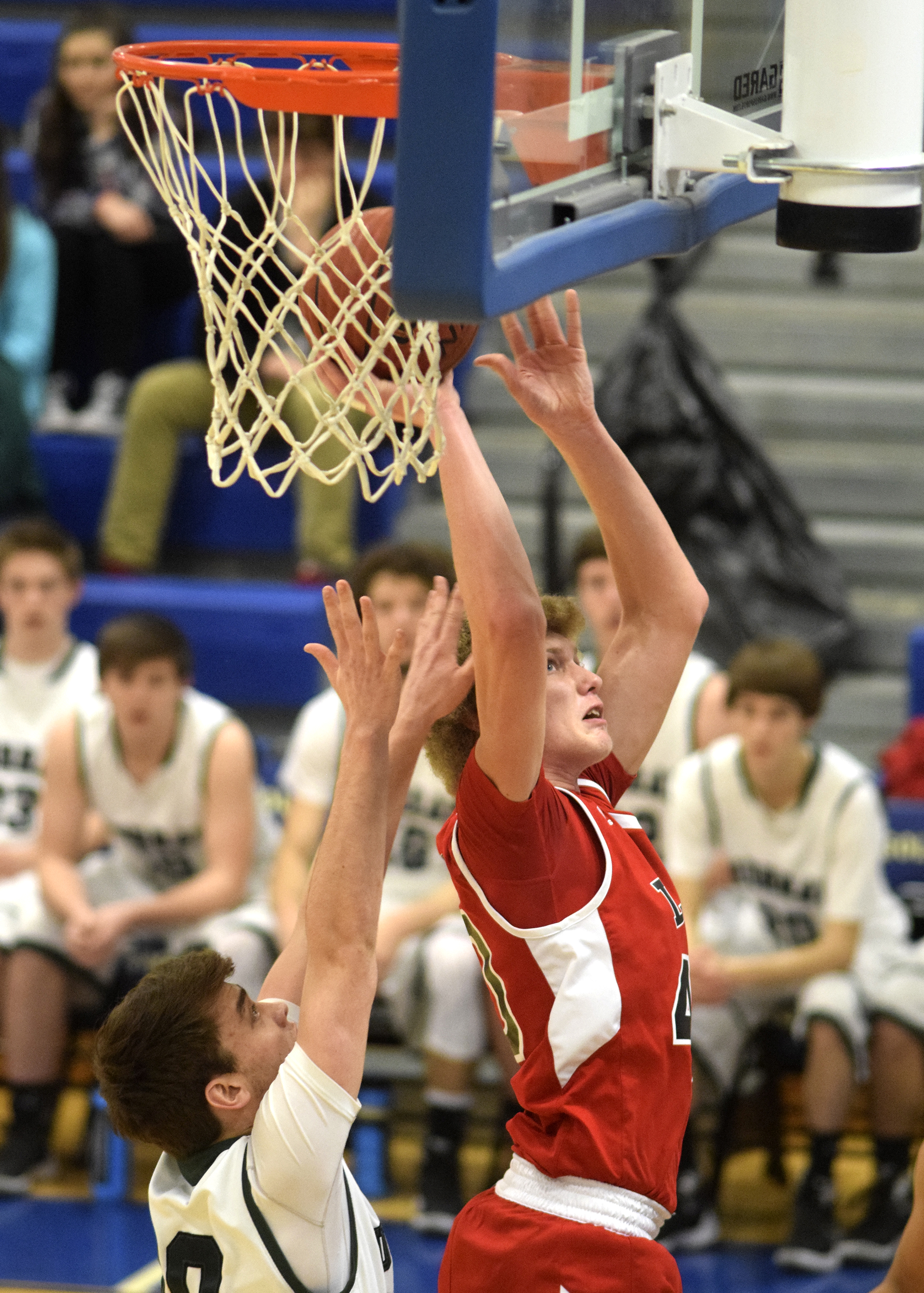 Lakeview's Triston Bennett (40) shoots from the baseline. The Lakeview-Fort Oglethrope Warriors faced the Murray County Indians in GHSA District 6-AAA basketball tournament at Ringgold High School, February 10, 2016.