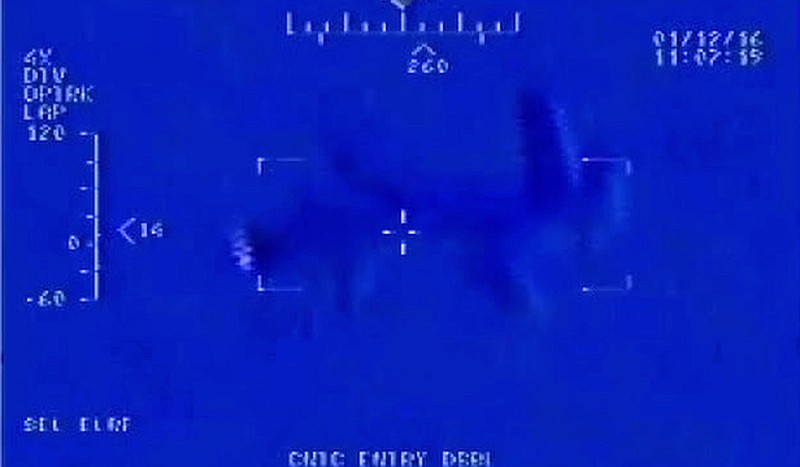 
              This Jan. 12, 2016, still image taken from video made available by the U.S. Navy shows Iranian drone" Shaheed " as it flies over the USS Harry S. Truman. That’s according to an internal U.S. Navy report on the Jan. 12 incident obtained Wednesday by The Associated Press through a Freedom of Information Act request. The Iranian drone was the first to conduct an overflight of an American carrier since 2014. (U.S. Navy via AP)
            