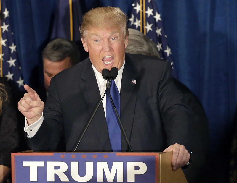 
              Republican presidential candidate, businessman Donald Trump speaks to supporters during a primary night rally, Tuesday, Feb. 9, 2016, in Manchester, N.H.  (AP Photo/David Goldman)
            