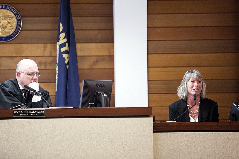 
              FILE - In this Feb. 3, 2016 file photo, Kerrie Evans of Gardiner, Mont., right, testifies in District Judge Mike Salvagni's courtroom during her negligent birth civil trial at the Gallatin County Law and Justice Center in Bozeman, Mont. A jury on Thursday, Feb. 11, 2016, ruled against Evans, who sought millions of dollars from health care providers she accused of failing to diagnose her unborn daughter’s cystic fibrosis.(Adrian Sanchez-Gonzalez/Bozeman Daily Chronicle via AP, File)
            