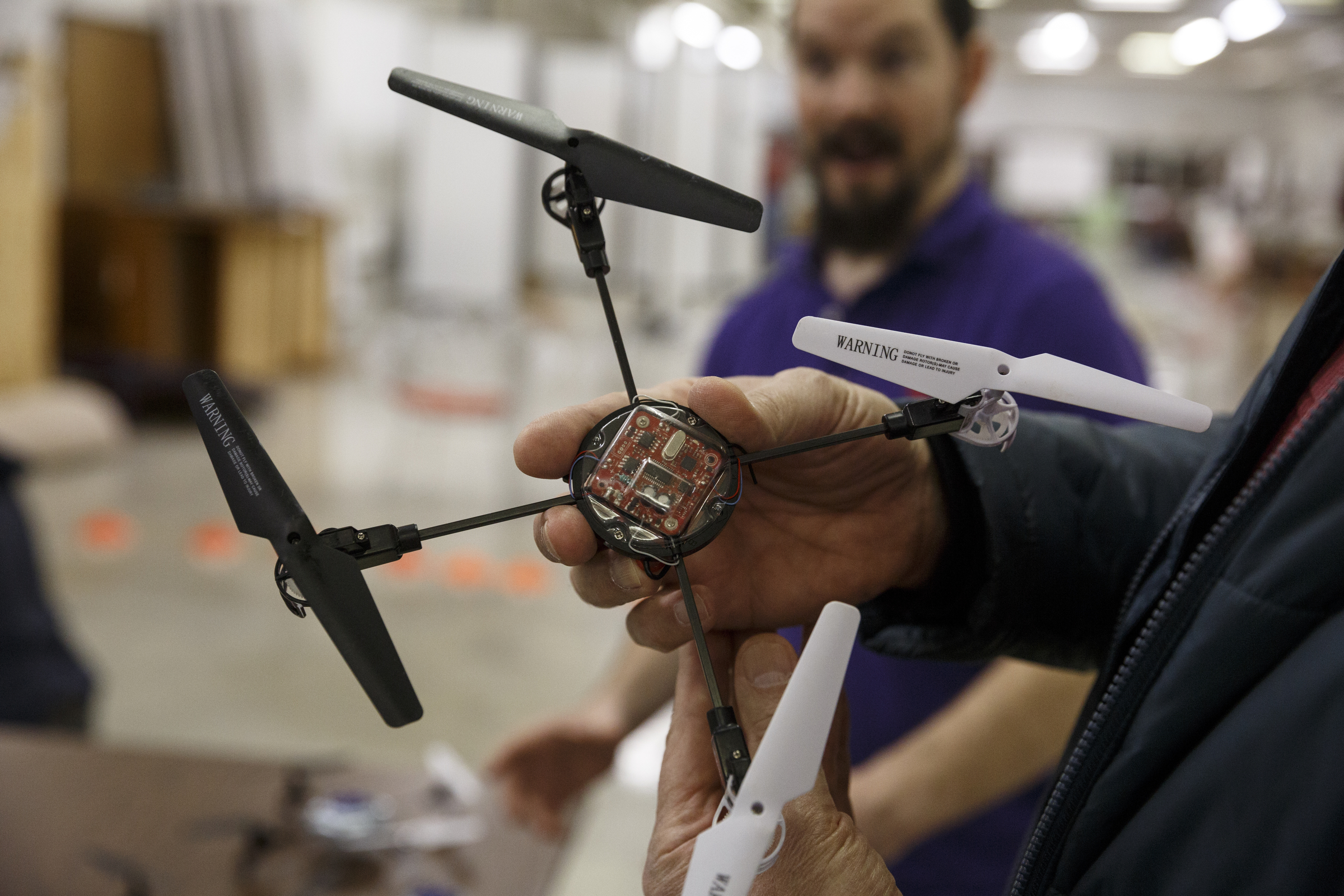 Tom Rush holds a radio controlled quad during the first session in an 8-week training course to teach people how to pilot drones at the Chattanooga Public Library on Saturday, Feb. 6, 2016, in Chattanooga, Tenn.