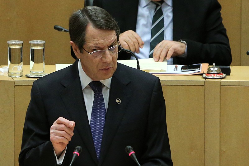 
              Cyprus' president Nicos Anastasiades speaks to the lawmakers at the Cyprus parliament in divided capital Nicosia, Cyprus, Thursday, Feb. 11, 2016. Anastasiades says peace talks aimed at reunifying the ethnically divided country have marked significant progress on how power will be shared with breakaway Turkish Cypriots and how the economy will function under an envisioned federation. (AP Photo/Petros Karadjias)
            