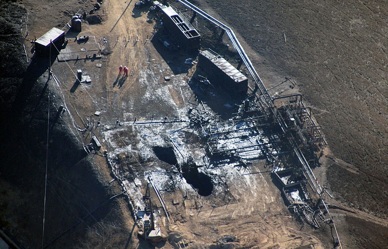 
              FILE - This Dec. 17, 2015 file photo provided by Earthworks shows an overhead aerial view of the relief well at the Aliso Canyon facility above the Porter Ranch area of Los Angeles. The utility says it has stopped the natural gas leak near Los Angeles after nearly 4 months. (Pete Dronkers/Earthworks via AP,File)
            