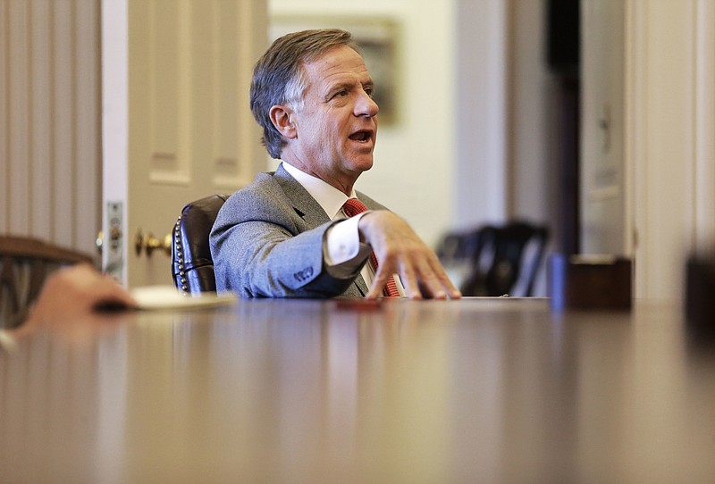 
              Tennessee Gov. Bill Haslam answers questions during an interview Thursday, Feb. 11, 2016, in Nashville, Tenn. Although the speakers of the Tennessee House and Senate want to allow people with handgun carry permits to be armed at the legislative office complex as soon as possible, Haslam said that he wants to maintain the gun ban for the Capitol, calling it a "secure building." (AP Photo/Mark Humphrey)
            