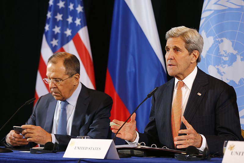 U.S. Secretary of State John Kerry, right, and Russian Foreign Minister Sergey Lavrov attend a news conference after the International Syria Support Group meeting in Munich, Germany, Friday, Feb. 12, 2016. 