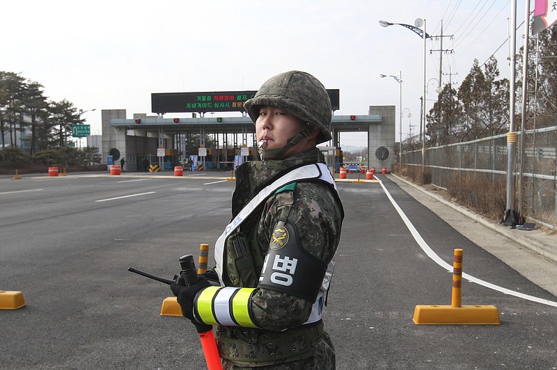 A South Korea Army soldier stands guard at the customs, immigration and quarantine office near the border village of Panmunjom, in Paju, South Korea, Thursday, Feb. 11, 2016.