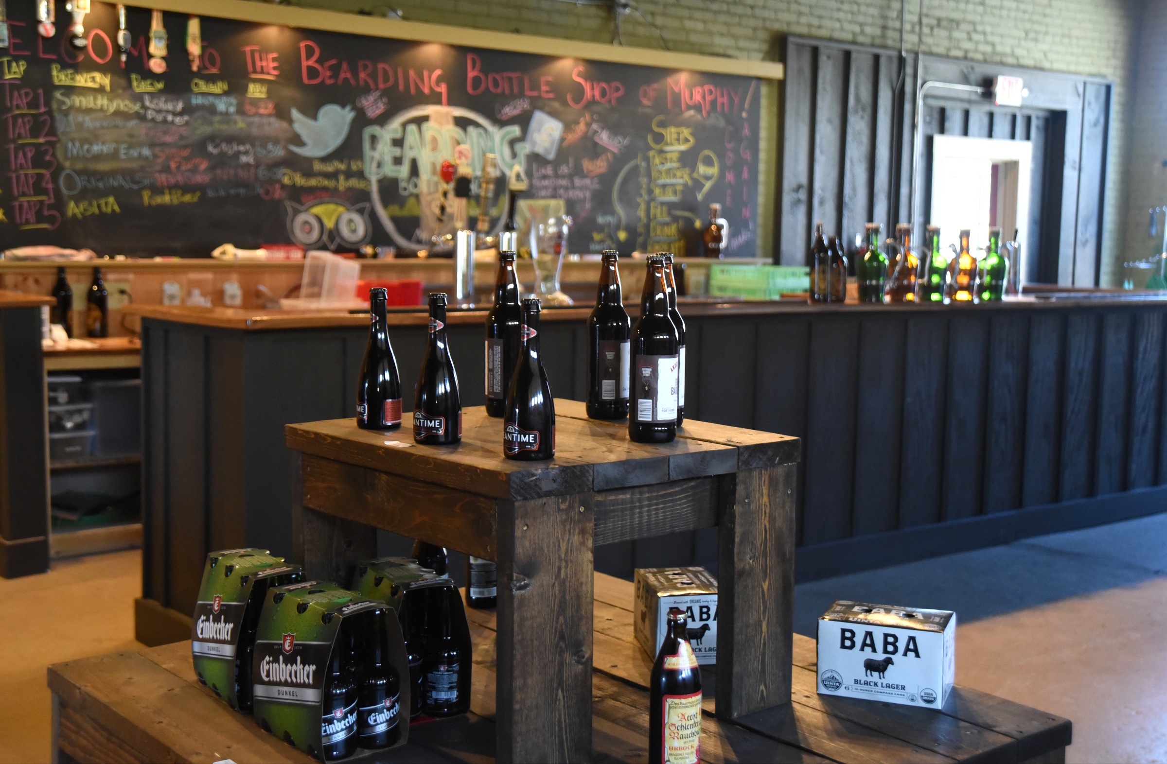 Many beers are on tap at the Bearding Bottle Shop in Murphy, N.C., Tuesday, January 19, 2016.