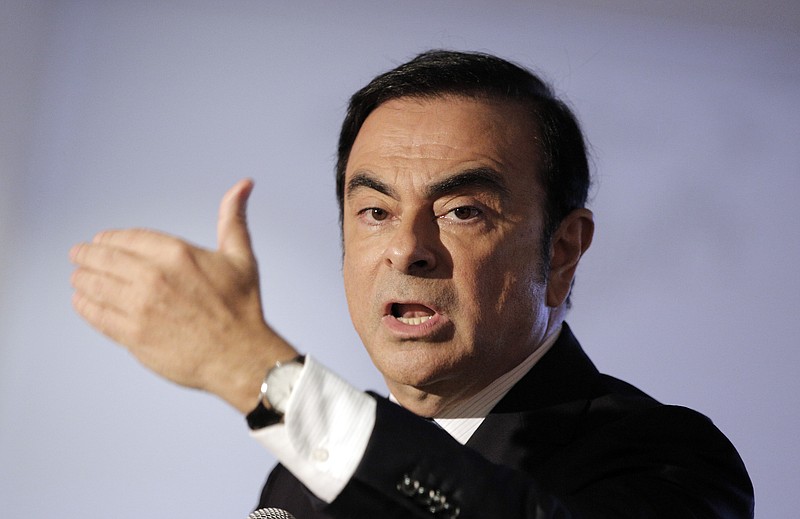 
              Chairman and CEO of Renault-Nissan Carlos Ghosn addresses reporters during a press conference in Boulogne Billancourt, outside Paris Friday, Feb. 12, 2016. French car maker Renault says higher sales and further progress on its industrial turnaround plan helped drive a nearly 1 billion euro increase in its earnings last year. (AP Photo/Christophe Ena)
            