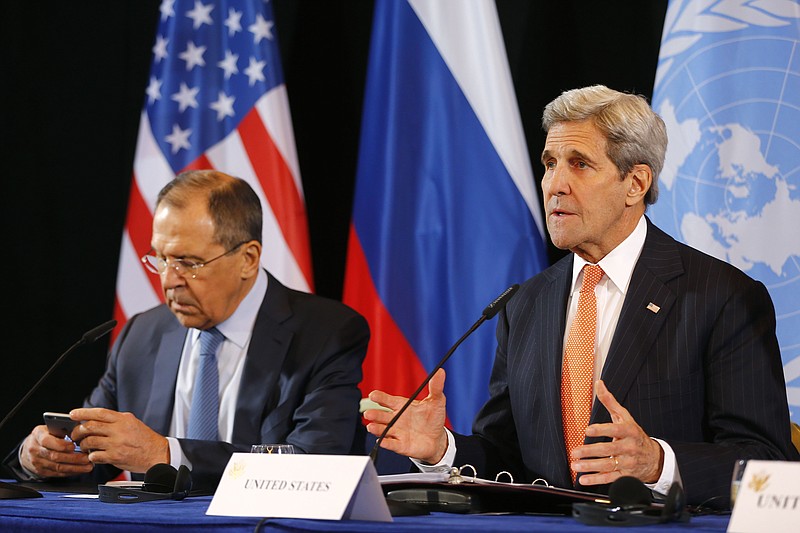 
              U.S. Secretary of State John Kerry, right, and Russian Foreign Minister Sergey Lavrov attend a news conference after the International Syria Support Group (ISSG) meeting in Munich, Germany, Friday, Feb. 12, 2016. Talks aimed at narrowing differences over Syria and keeping afloat diplomacy to end its civil war have gotten under way in Munich. (AP Photo/Matthias Schrader)
            