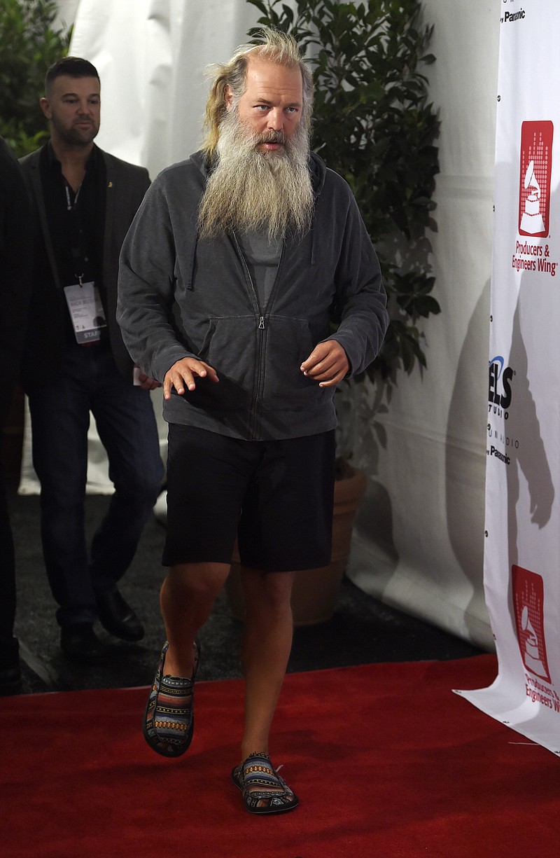 
              Music producer Rick Rubin arrives at the ninth annual Grammy Week Event honoring him at The Village Recording Studios on Thursday, Feb. 11, 2016, in Los Angeles. (Photo by Chris Pizzello/Invision/AP)
            