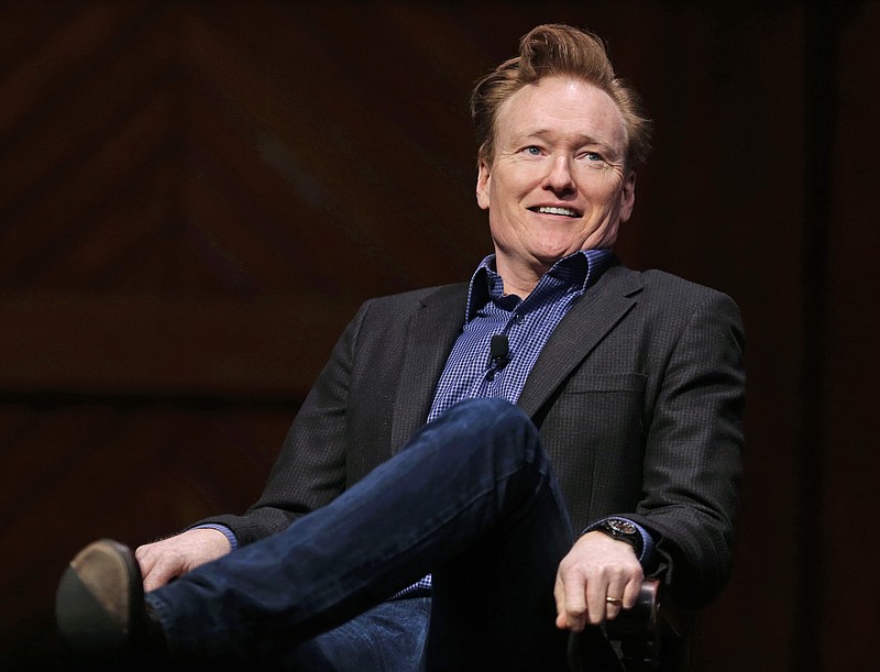 
              Television host Conan O'Brien smiles towards the audience at Sanders Theatre on the campus of Harvard University in Cambridge, Friday, Feb. 12, 2016.  O'Brien, who graduated from the school in 1985, shared a conversation with Harvard President Drew Faust and an audience of guests. (AP Photo/Charles Krupa)
            
