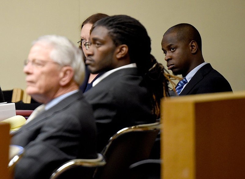 Former Tennessee football players A.J. Johnson, center, and Michael Williams appear for a motion hearing social media requests in front of Knox County Criminal Court Judge Bob McGee Tuesday, Oct. 27, 2015. The two are accused of raping a UT female athlete Nov. 16, 2014, during a party at Johnson's apartment after a UT football game. Photo by Amy Smotherman Burgess/News Sentinel