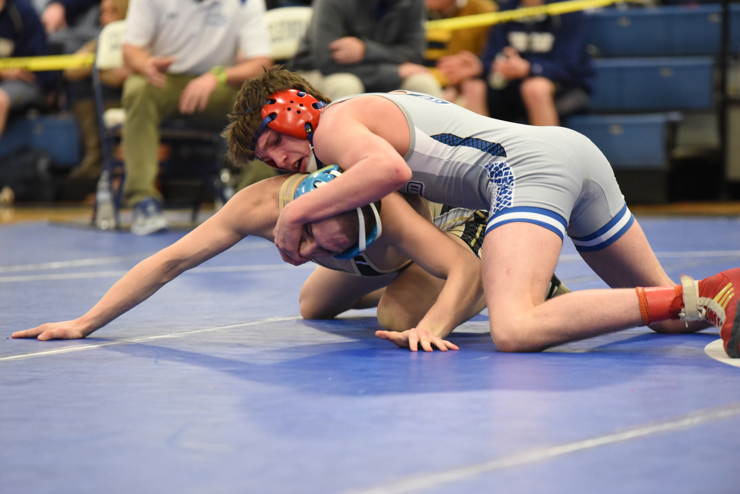 Bradley Central's Ryan McElhaney, bottom, wrestles Cleveland's Logan Whiteside in the 120-pound final Saturday in the Region 4-AAA tournament in Cleveland, Tenn. McElhaney won 4-0.