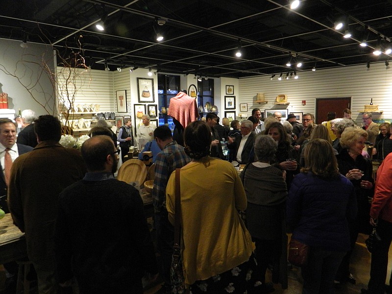 A members-only sneak peek event at Cleveland's Museum Center at Five Points' recently renovated store fills the reimagined retail space with customers and local artists.