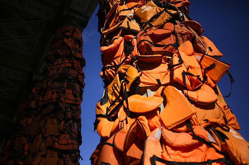 
              A art installation by Chinese artist Ai Weiwei with life  vests used by refugees and collected on  the Greek island of Lesbos is set up at the Konzerthaus  Berlin (Concert Hall Berlin) for the Cinema For Peace gala alongside the 2016 Berlinale Film Festival in Berlin, Saturday, Feb. 13, 2016. The charity gala will take place at the Konzerthaus   on Monday, Feb. 15, 2016. (AP Photo/Markus Schreiber)
            