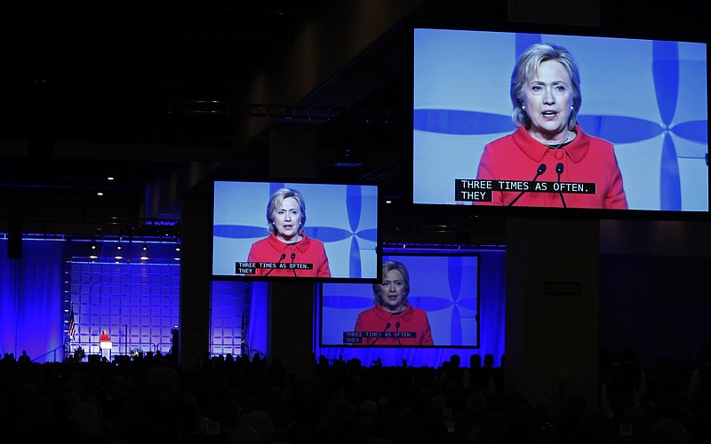 
              Democratic presidential candidate, Hillary Clinton speaks at the state's Democratic-Farmer-Labor (DFL) party's Humphrey-Mondale dinner, Friday, Feb. 12, 2016, in St. Paul, Minn  (AP Photo/Jim Mone)
            