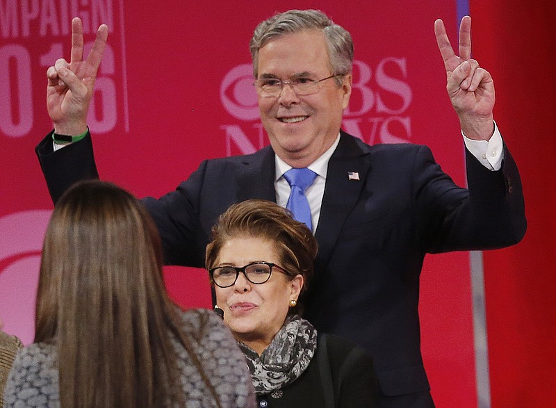
              Republican presidential candidate, former Florida Gov. Jeb Bush poses for a photograph after the CBS News Republican presidential debate at the Peace Center, Saturday, Feb. 13, 2016, in Greenville, S.C. (AP Photo/John Bazemore)
            