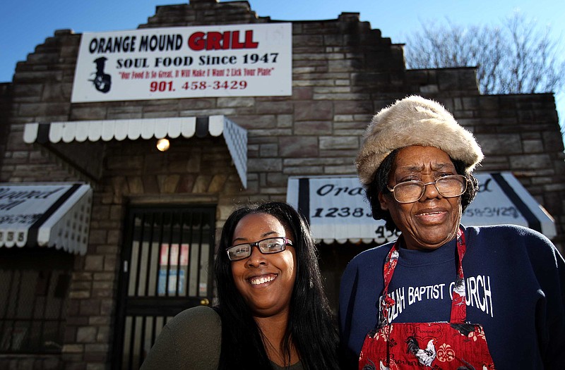 
              In this photo taken on Feb. 4, 2016, Daisy Miller, right, stands outside her Orange Mound Grill with her granddaughter Hope Miller-Beck, in Memphis, Tenn. Miller has been working at the restaurant for 57 year and plans to pass the torch to Miller-Beck when she eventually retires, which she plans to do in two years. (Mike Brown/The Commercial Appeal via AP) MANDATORY CREDIT
            