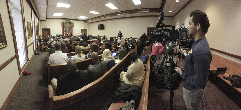 Staff Photo by Dan Henry / The Chattanooga Times Free Press- 2/15/16. (Image taken with the iPhone Panorama App.) Media report as defendants appear before Judge Robert Philyaw during a preliminary hearing for the Ooltewah High School basketball coaches and the school's athletic director in Hamilton County Juvenile Court on February 15, 2016. Hamilton County District Attorney Neal Pinkston charged head coach Andre "Tank" Montgomery, assistant coach Karl Williams and Athletic Director Allard "Jesse" Nayadley with failing to report child abuse or suspected child sexual abuse in connection with the rape of an Ooltewah High School freshman by his basketball teammates Dec. 22, 2015. 