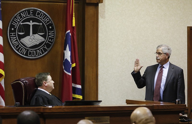 Staff Photo by Dan Henry / The Chattanooga Times Free Press- 2/15/16. Superintendent of Hamilton County Schools Rick Smith is sworn in as a witness before Judge Robert Philyaw during a preliminary hearing for the Ooltewah High School basketball coaches and the school's athletic director in Hamilton County Juvenile Court on February 15, 2016. Hamilton County District Attorney Neal Pinkston charged head coach Andre "Tank" Montgomery, assistant coach Karl Williams and Athletic Director Allard "Jesse" Nayadley with failing to report child abuse or suspected child sexual abuse in connection with the rape of an Ooltewah High School freshman by his basketball teammates Dec. 22, 2015. 